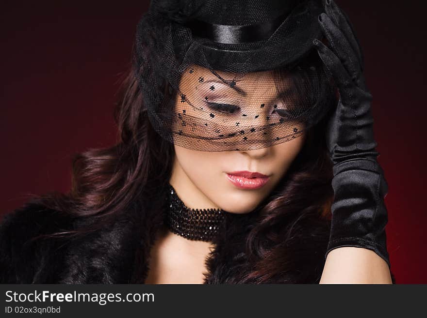 Sexy fashionable woman in a hat