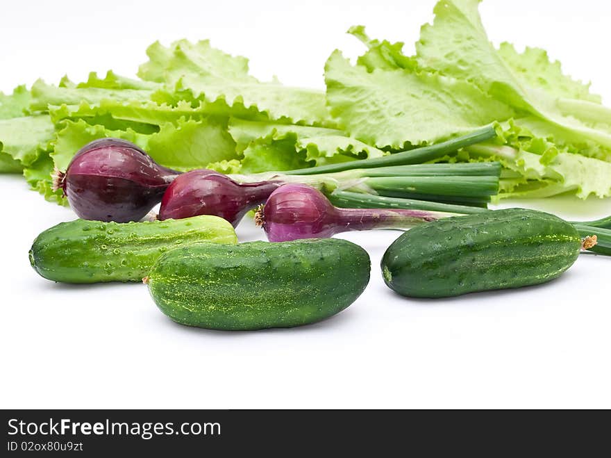 Green cucumbers with onion