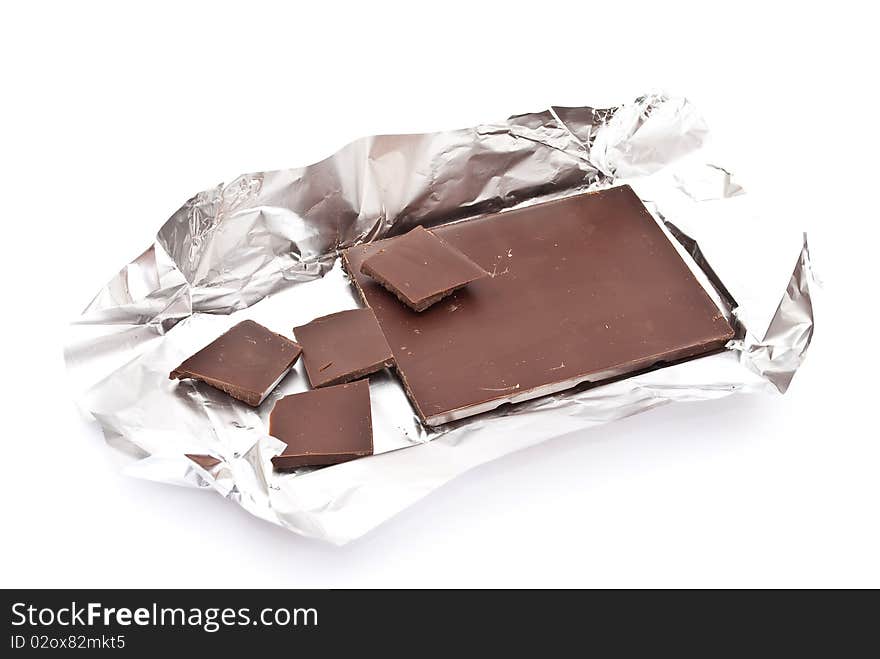 Broken chocolate on a foil