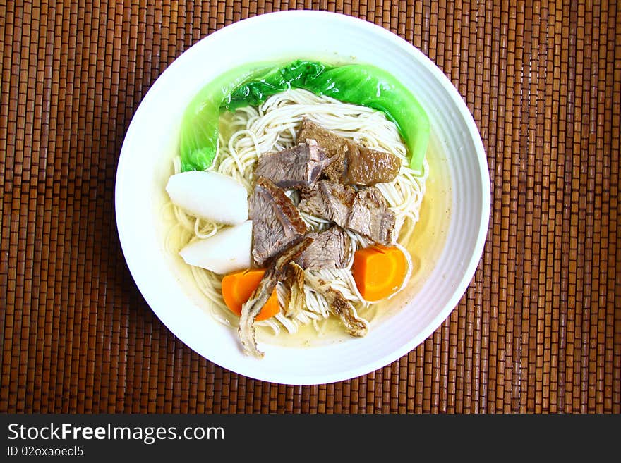 Beef noodles .Chinese food in a restaurant.