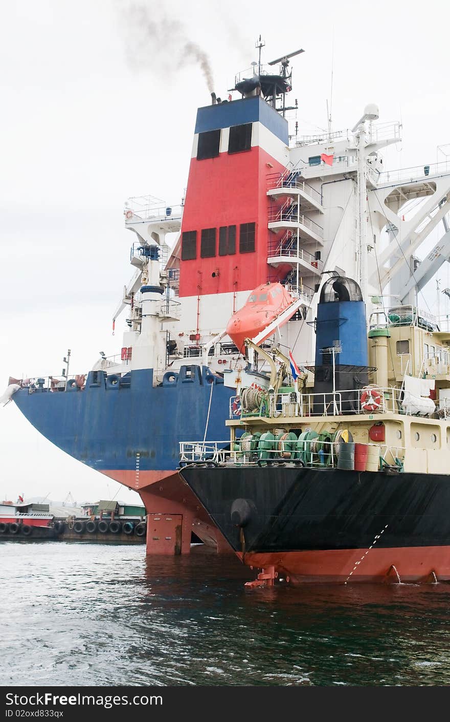 Two ships moored at port