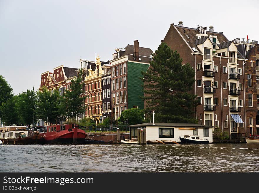 Amsterdam typical houses on a blue sunny day