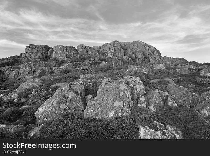 Cliff and rocks formation in nature with a nice sky in the background. Cliff and rocks formation in nature with a nice sky in the background.