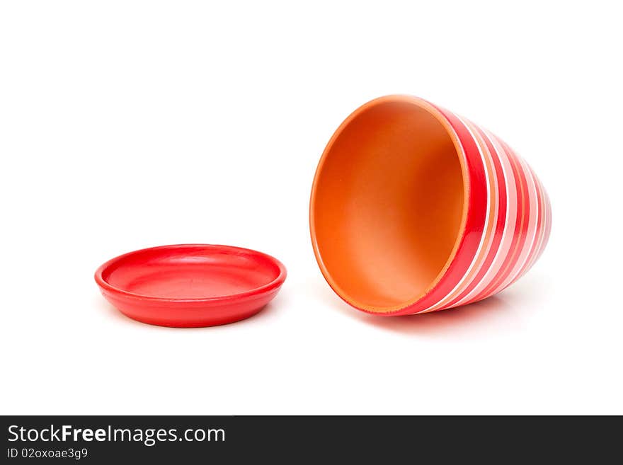 Red flowerpot isolated on white background.