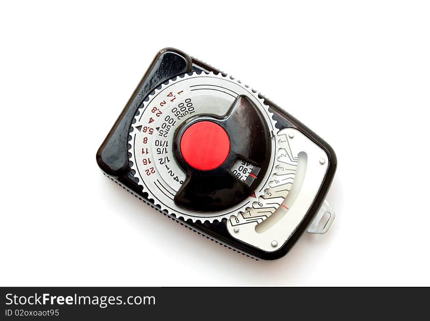 Vintage light meter isolated on white background.