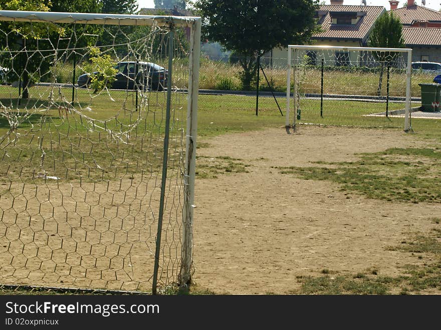 A playground for kids in the middle of the green. A playground for kids in the middle of the green