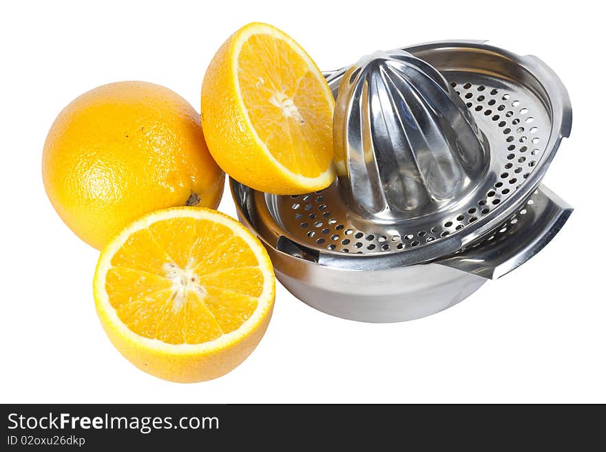 Oranges and mechanical manual juicer on a white background. Oranges and mechanical manual juicer on a white background