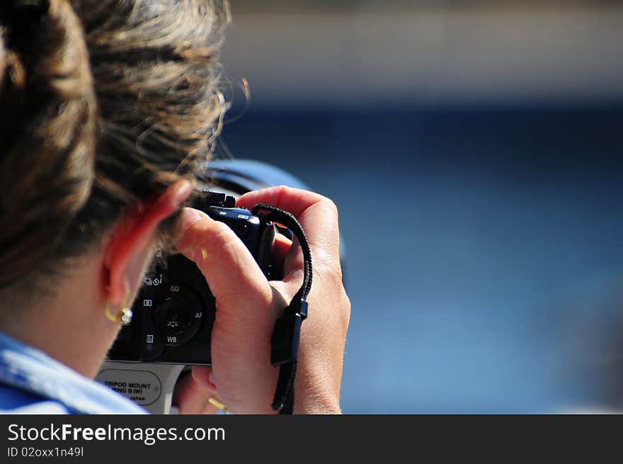 Photographer in action during a sail race. Photographer in action during a sail race