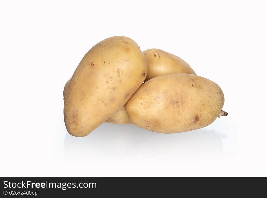 Few raw potatoes isolated on white background with clipping path