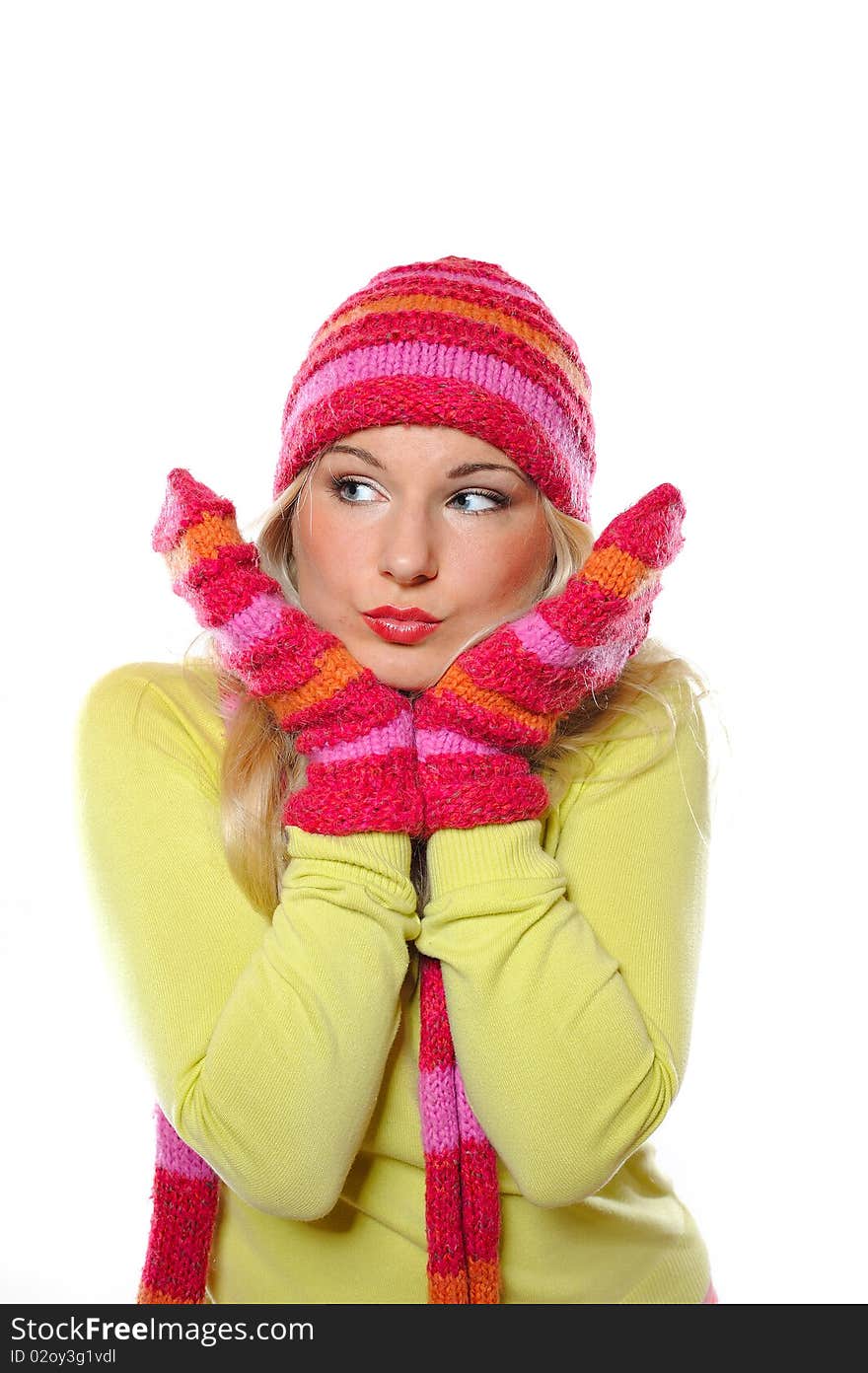 Seasonal portrait of pretty funny woman in hat and gloves smiling