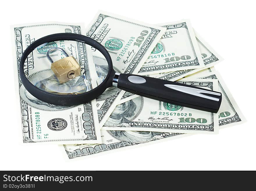 Money U.S. dollars, magnifying glass and lock isolated on white background