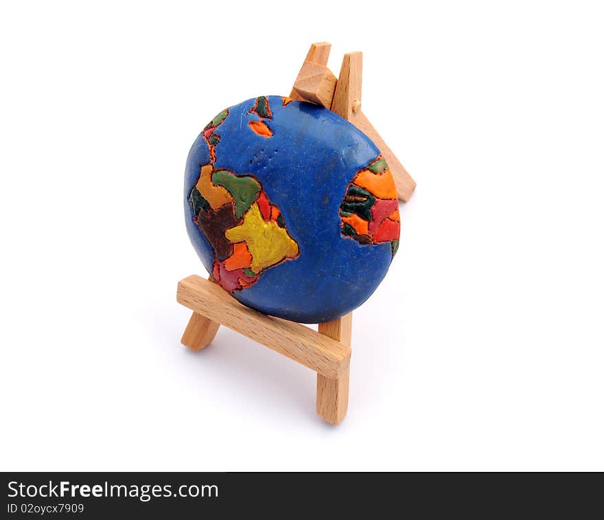 Handmade model of Earth on easel. Handmade model of Earth on easel