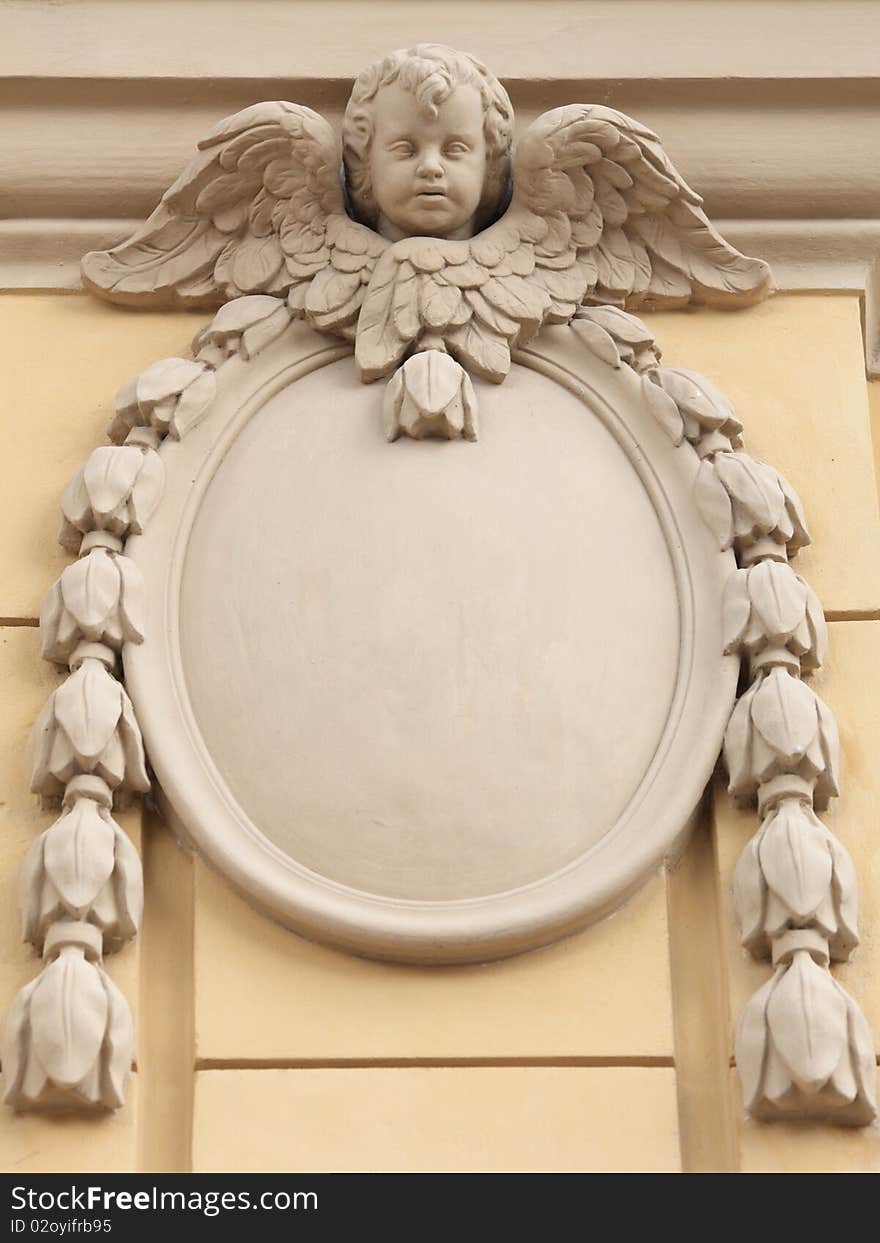 Architectural decor on Peter and Pavel's Cathedral in St.-Petersburg. A bas-relief representing the cherub