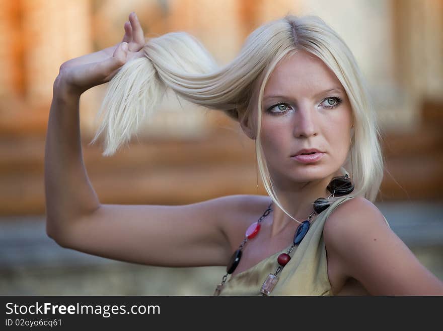 Beautiful woman holding her hair