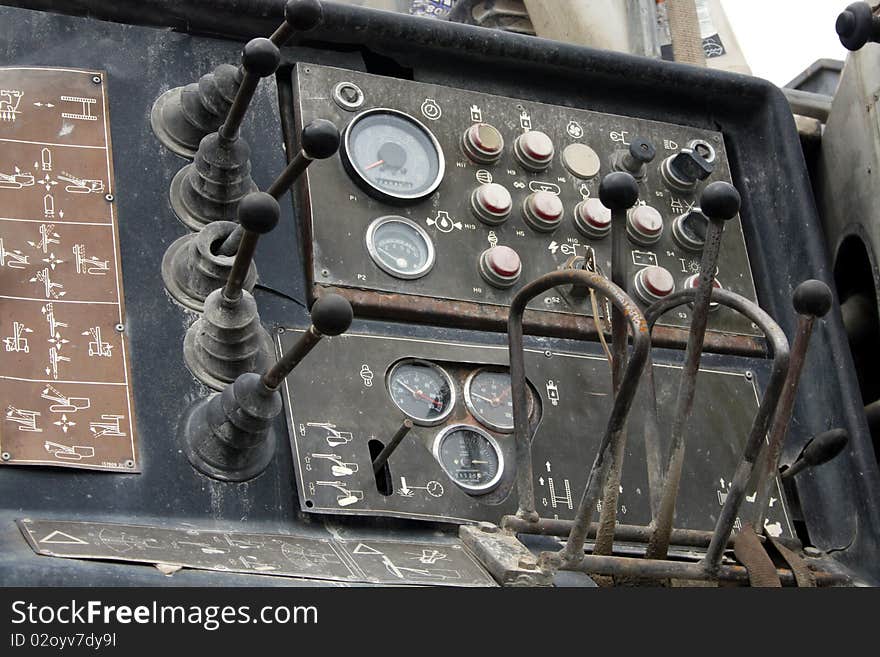 Dashboard of hydraulic drill with switches and meters. Dashboard of hydraulic drill with switches and meters