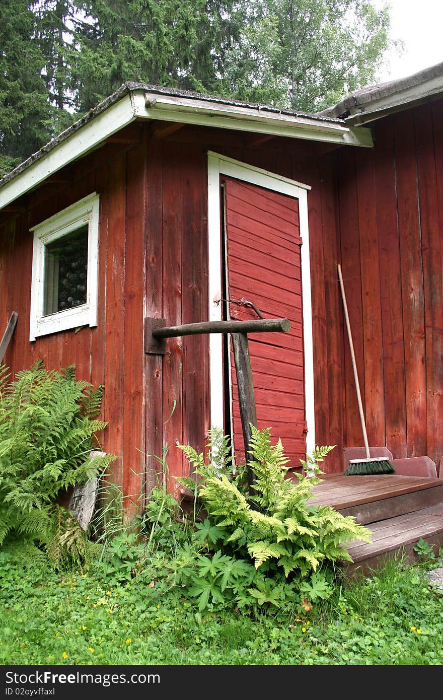 Entrance of old wooden cabin or rural outhouse