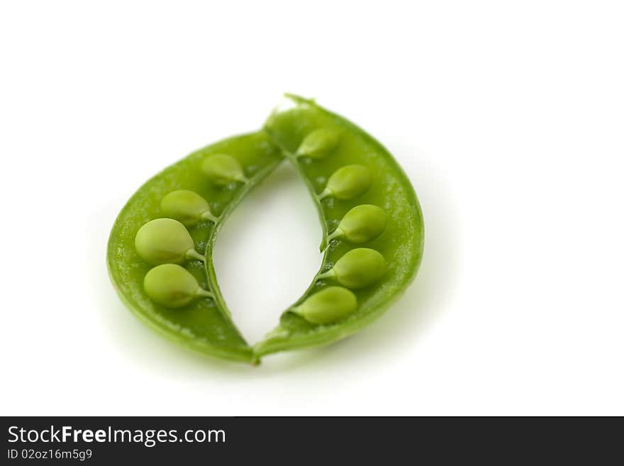 Fresh green peas in a pod