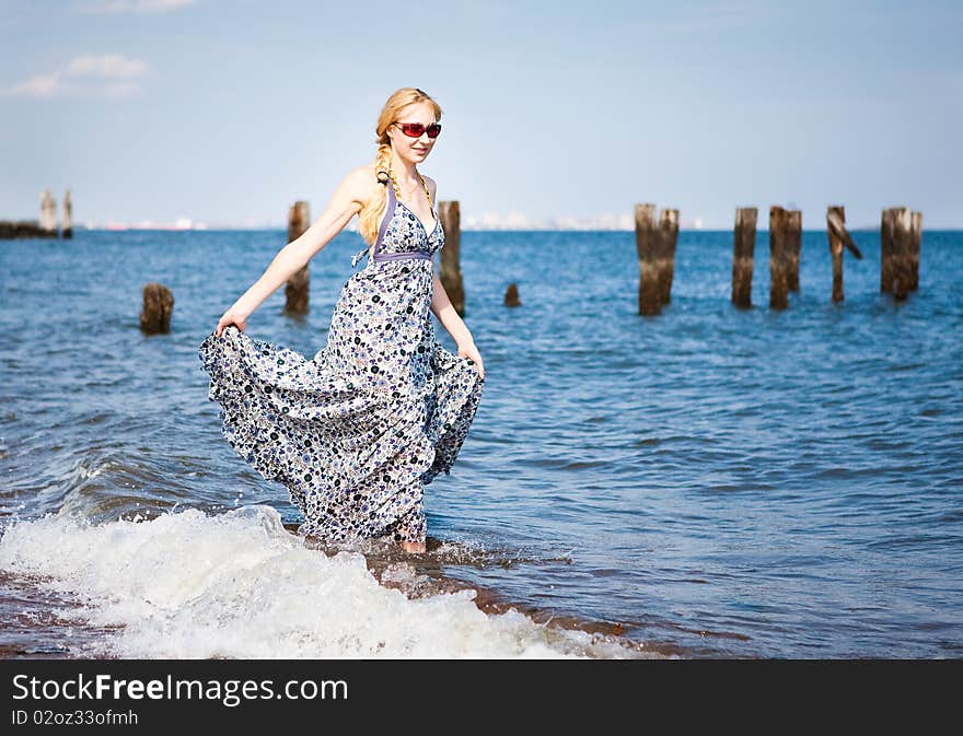 Young beautiful woman  on the beach. Young beautiful woman  on the beach