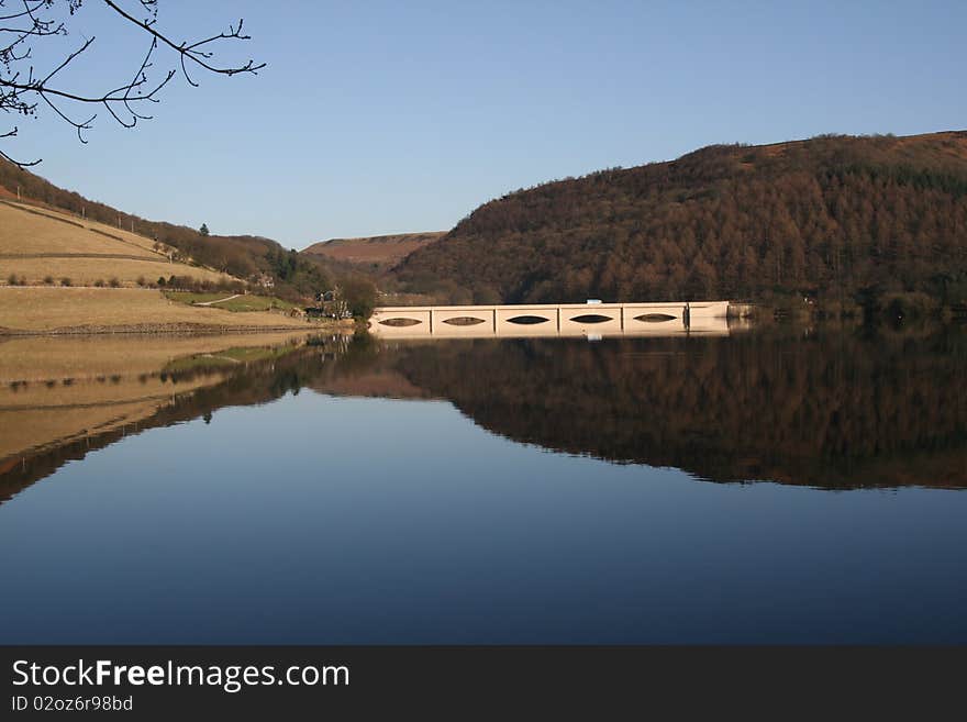 Unusual reflection image taken at Derwent reservoir and bridge (Peak District). Unusual reflection image taken at Derwent reservoir and bridge (Peak District)