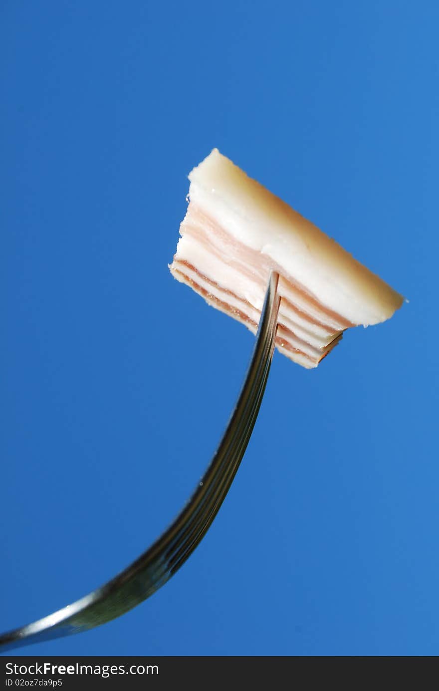 Fork With A Slice Of Bacon