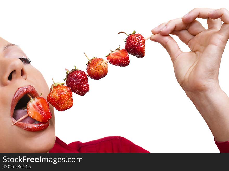 Woman`s Mouth  With Red Strawberries