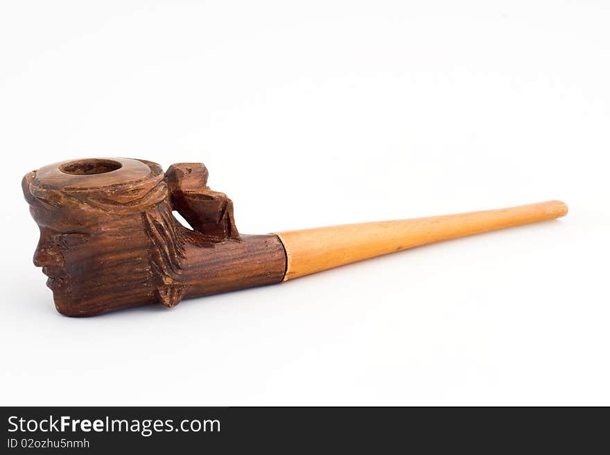 Wooden tobacco pipe with Indian head isolated on white background