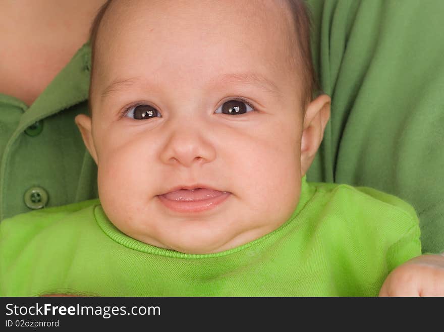 Newborn in the arms of his father