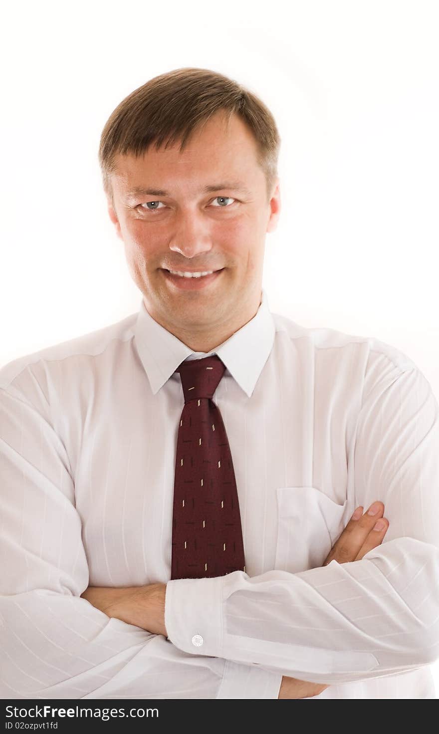 Portrait of a happy businessman on a white background