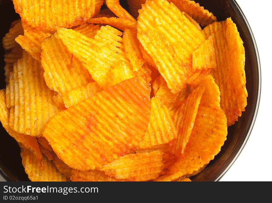 Crispy potato chips spiced with hot paprika