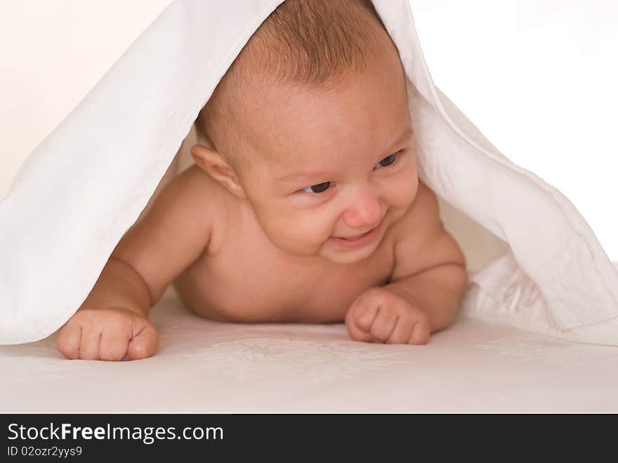 Portrait of a beautiful newborn baby on a white