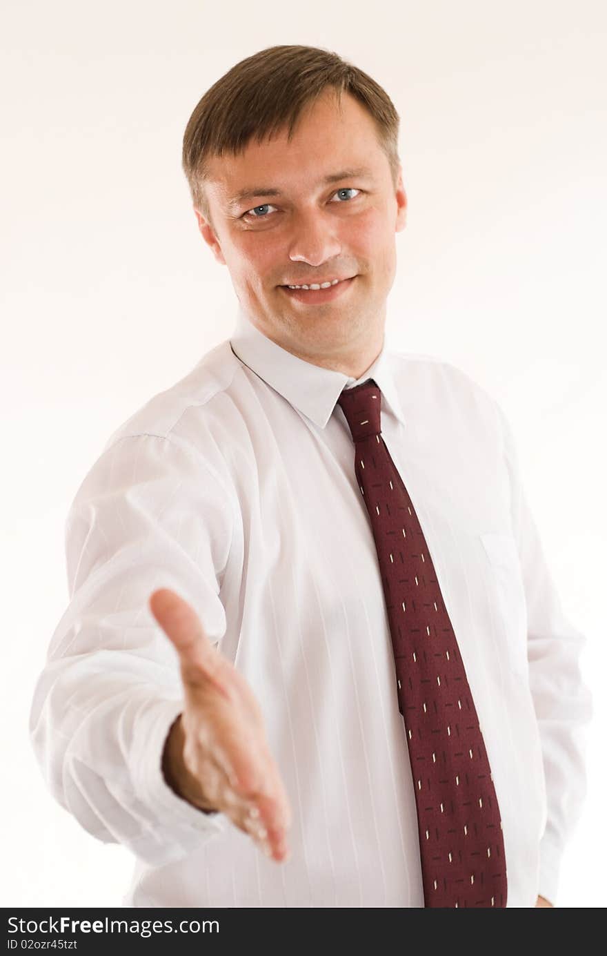 Portrait of a happy businessman on a white background