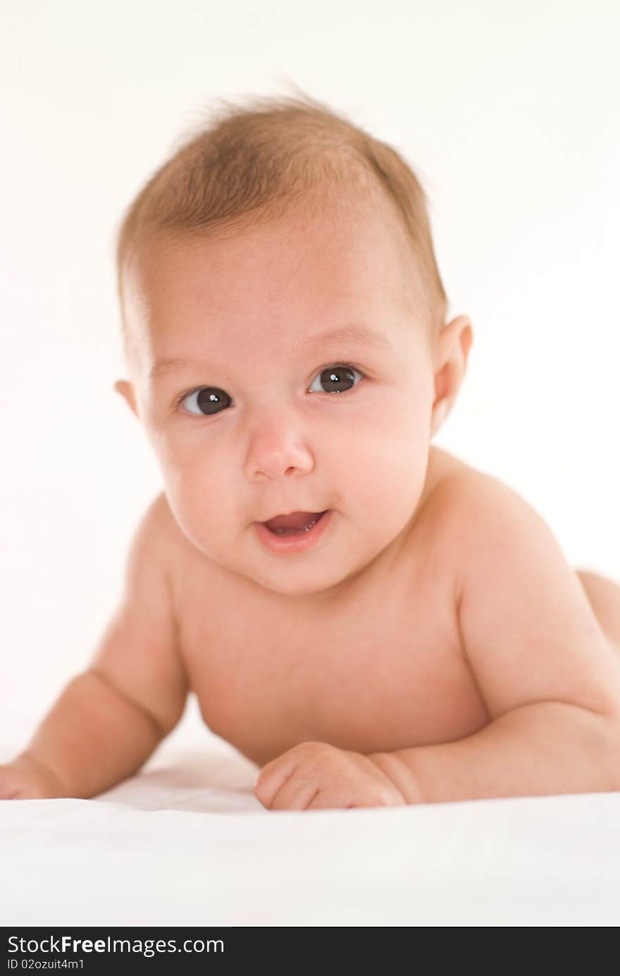 Portrait of a beautiful newborn on a white background