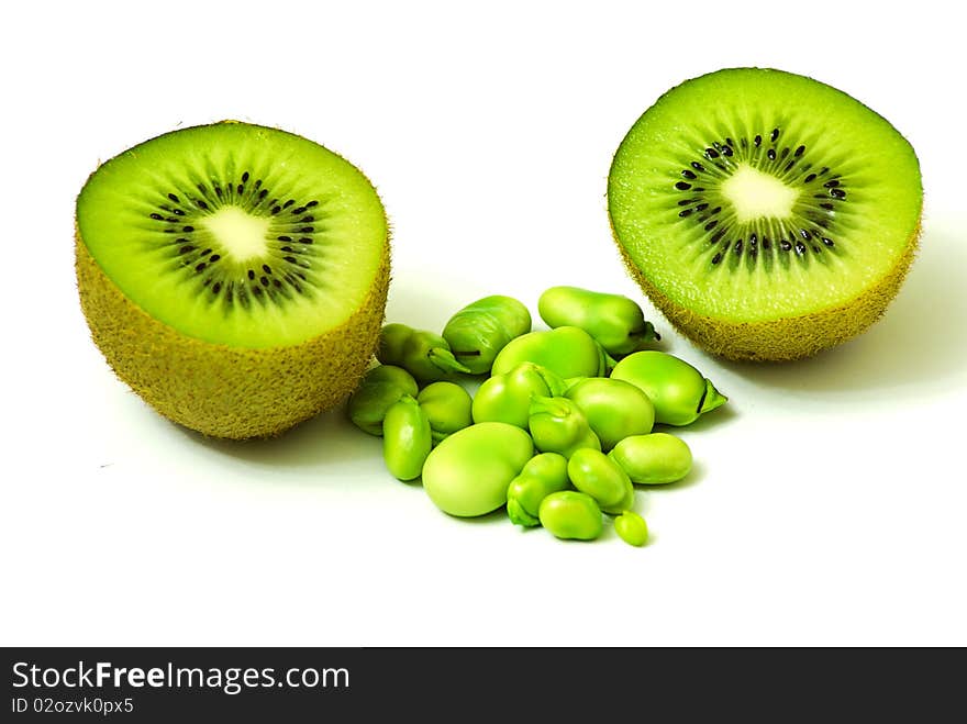 Kiwis with beans on white background