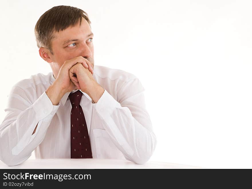 Happy businessman on a white