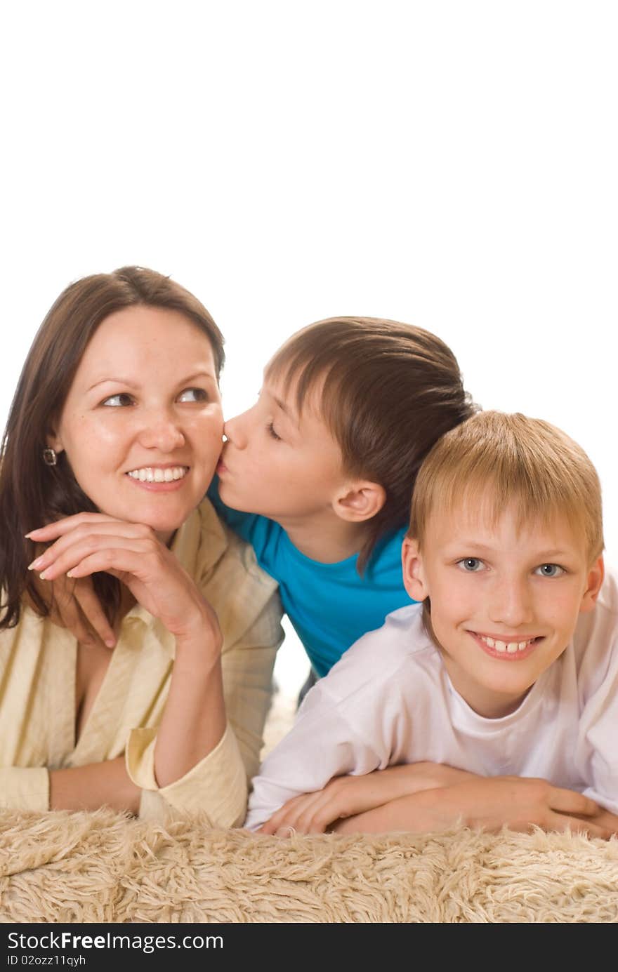 Happy mom and children on a white background