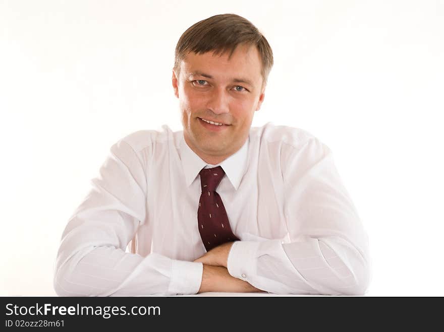 Happy businessman on a white background