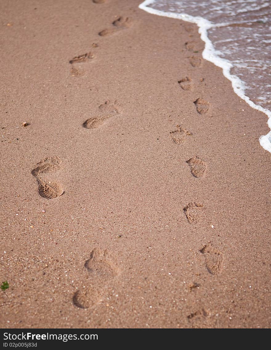 Image of footprints on the beach. Image of footprints on the beach