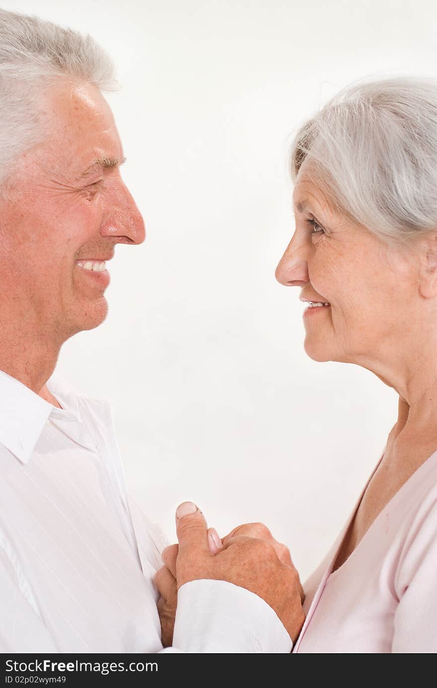 Elderly couple together on a white background