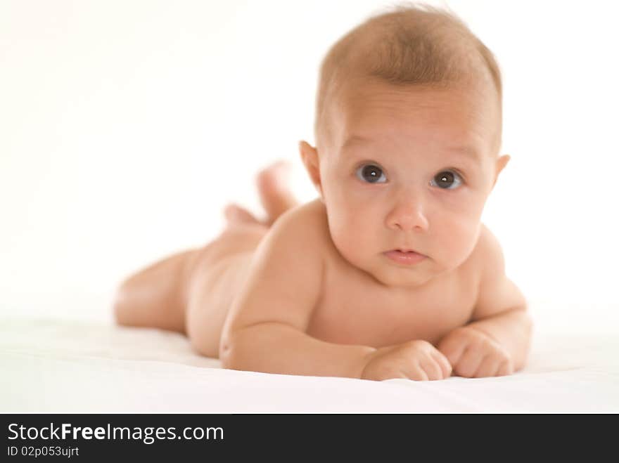 Newborn baby on a white