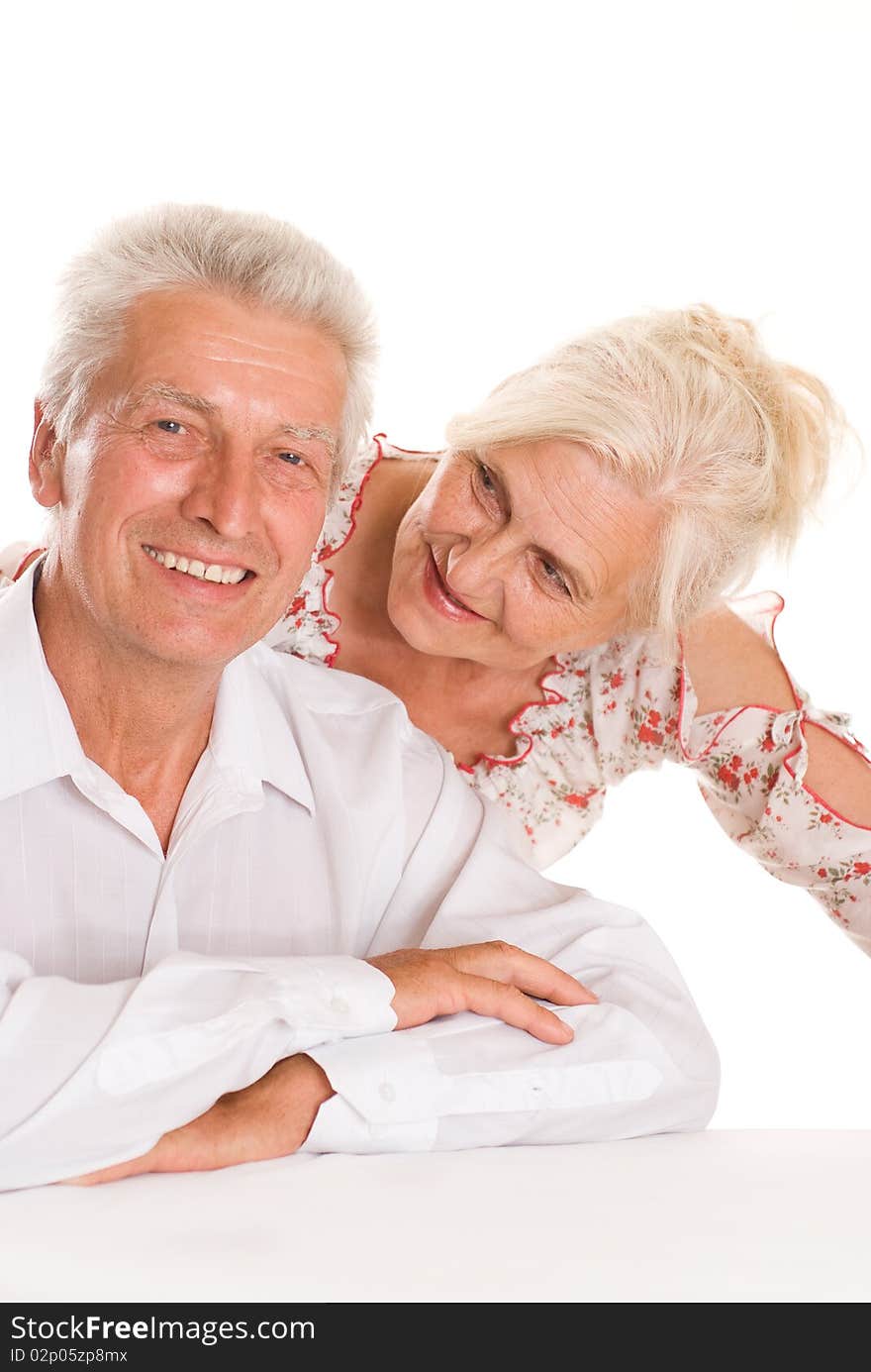 Happy elderly couple together on a white background. Happy elderly couple together on a white background