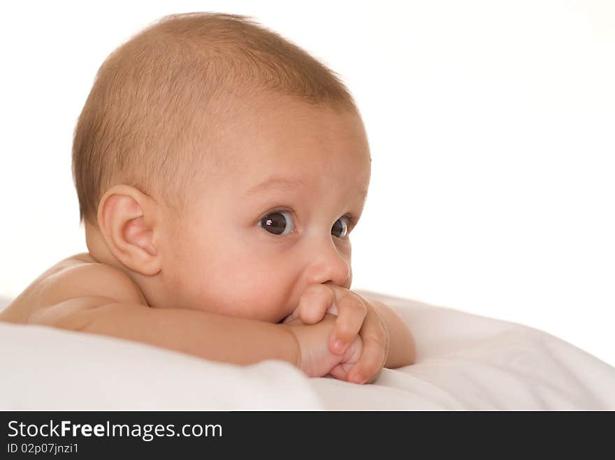 Portrait of a beautiful newborn  on a white