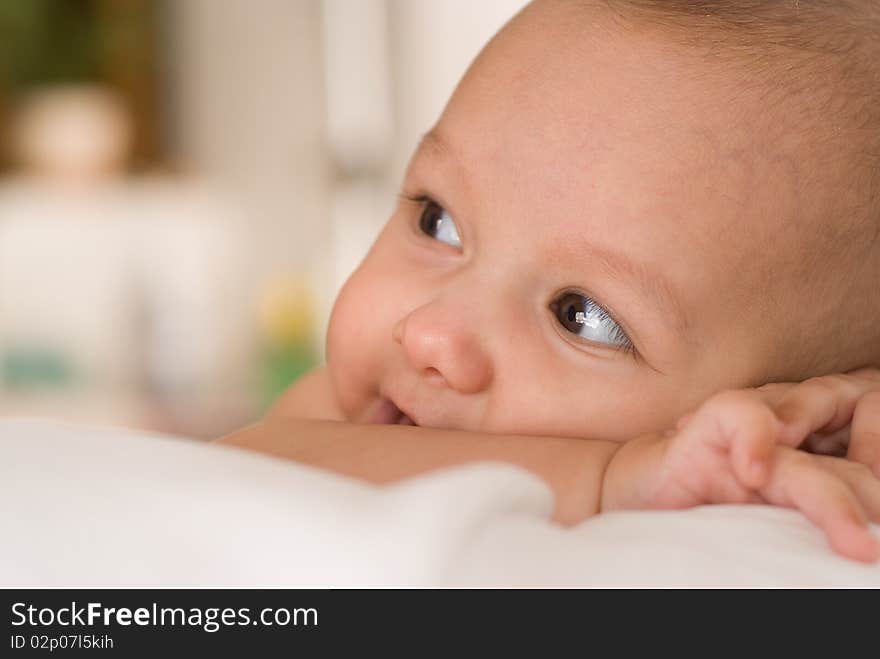 Portrait of a beautiful baby on a white