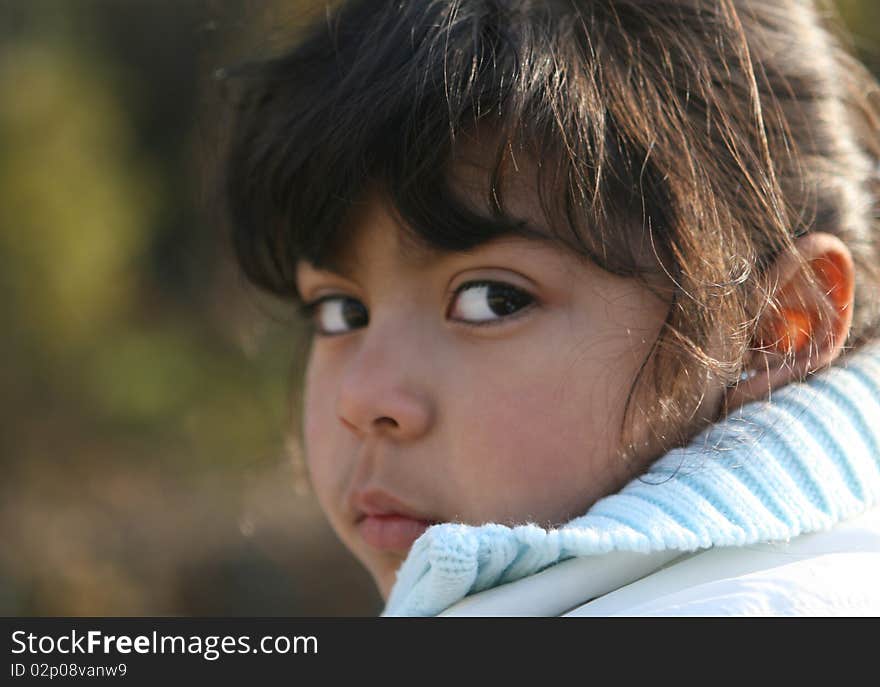 Little southamerican black hair girl looking camera. Little southamerican black hair girl looking camera