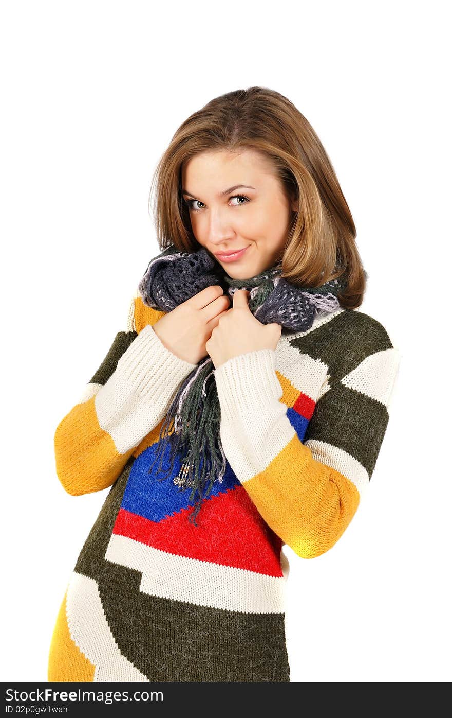 Beautiful smiling girl in beautiful warm colorful sweater, isolated on white