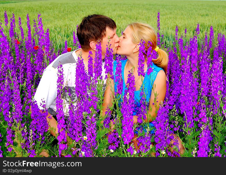 Loving couple in the meadow