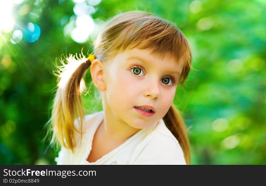 Liitle Girl On Green Background