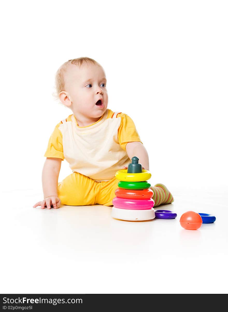 Little boy with a pyramid on white background