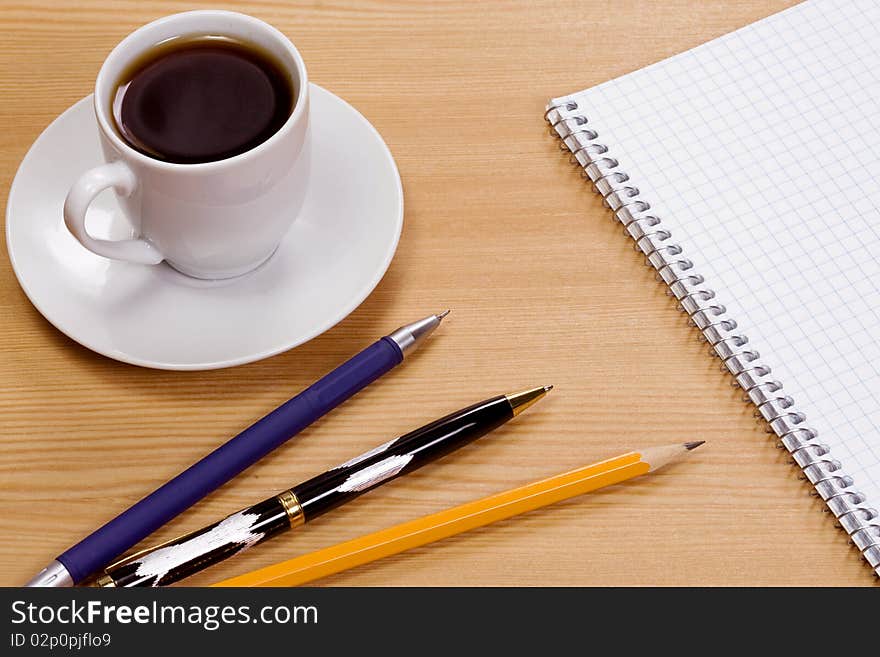 Cup of coffee at table. Cup of coffee at table