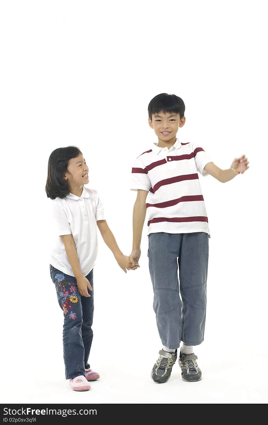 Beautiful little girl with his brother laughing. Isolated. Beautiful little girl with his brother laughing. Isolated