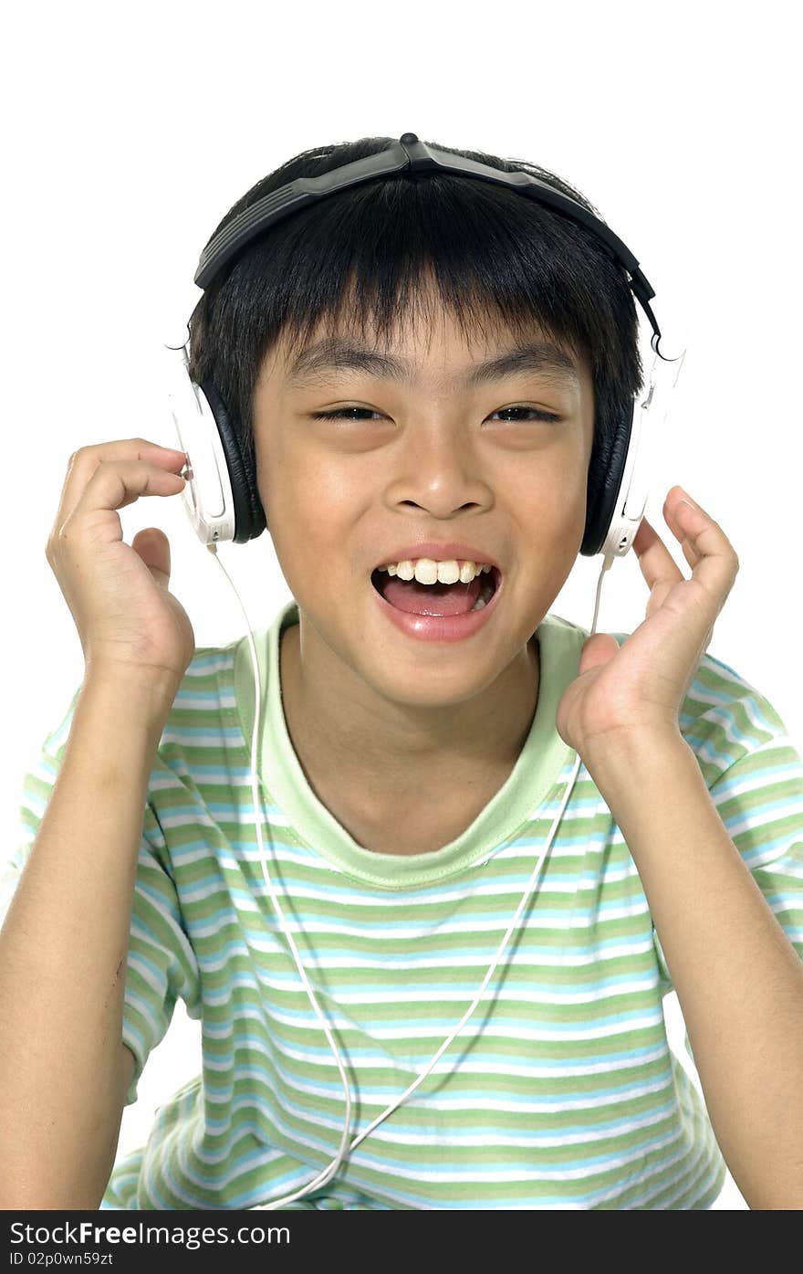 Boy listening to music with headphones. Boy listening to music with headphones